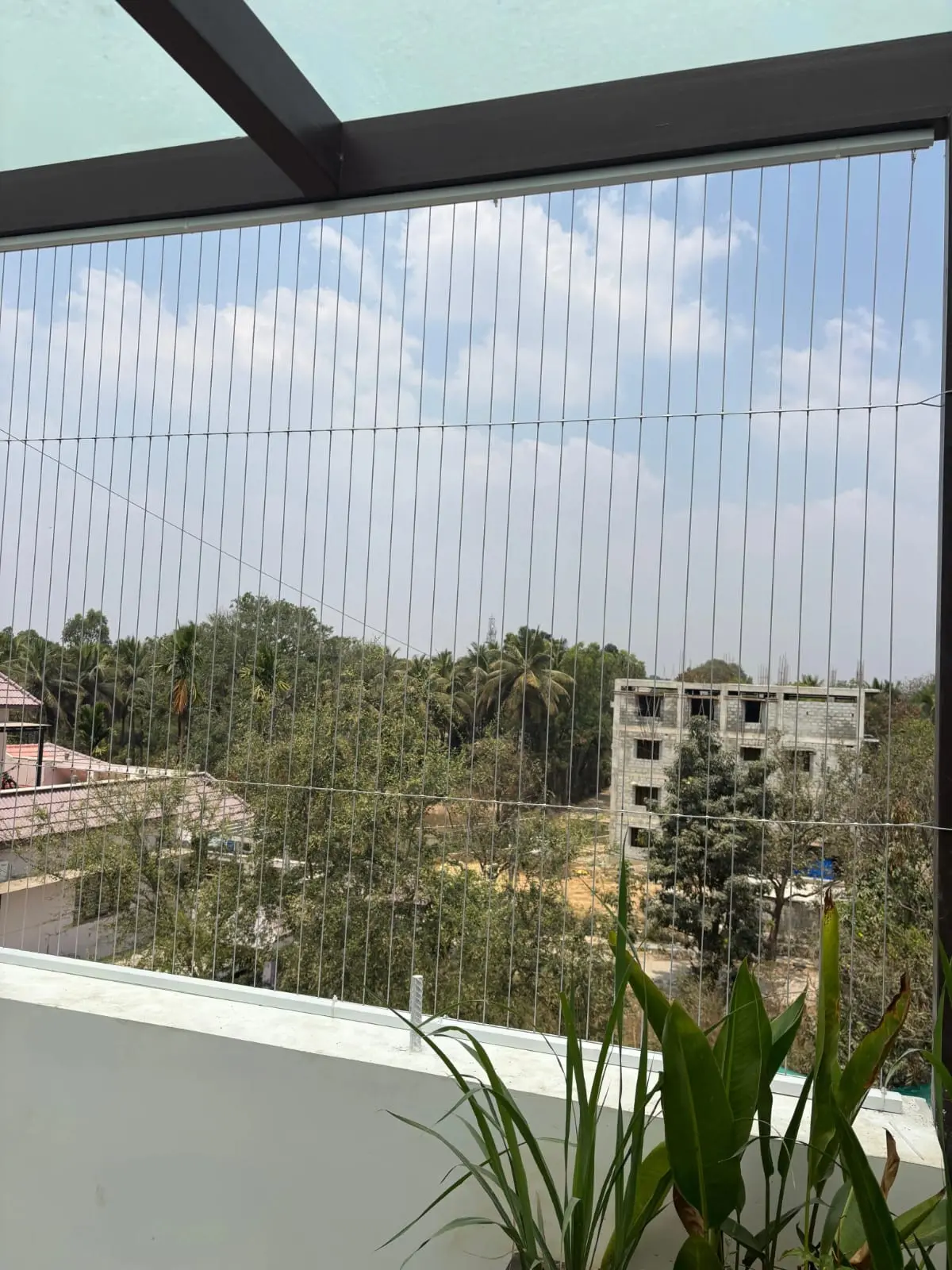 Invisible grills installed on apartment window Bangalore